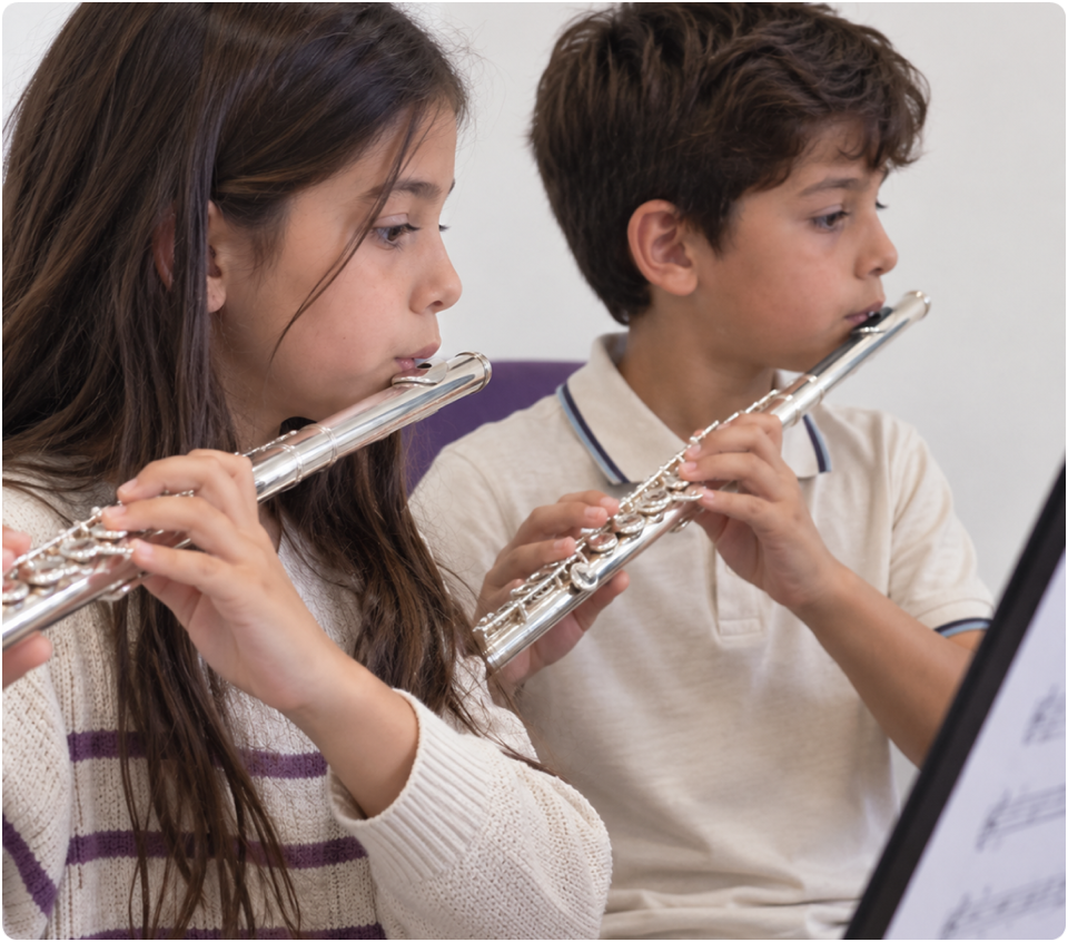 Children learning flute together
